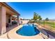 Relaxing kidney-shaped pool with spa and patio at 1269 N Layman St, Gilbert, AZ 85233