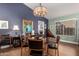 Dining room with a round table and dark-colored chairs at 14215 W Mountain Laurel Trl, Surprise, AZ 85374