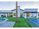 Backyard view of house with covered patio and pool at dusk at 14241 N 54Th St, Scottsdale, AZ 85254