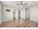 Spacious bedroom with wood-look floors and a large closet at 14352 W Lamoille Dr, Surprise, AZ 85374