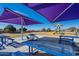 Community playground area with shaded tables and play structures at 14352 W Lamoille Dr, Surprise, AZ 85374