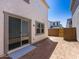 A spacious backyard with dirt and patio area that's ready to landscape and customize at 14644 W Sand Hills Rd, Surprise, AZ 85387