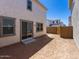 Backyard with dirt and patio area. Perfect for adding your own landscaping at 14644 W Sand Hills Rd, Surprise, AZ 85387