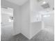 Hallway view, featuring multiple windows for natural light at 14644 W Sand Hills Rd, Surprise, AZ 85387