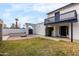 View of backyard with patio, fire pit, and house exterior at 1506 E Topeka Dr, Phoenix, AZ 85024