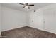 Bright bedroom with double door closet and carpet at 1506 E Topeka Dr, Phoenix, AZ 85024