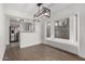 Dining area with hardwood floors and kitchen access at 1506 E Topeka Dr, Phoenix, AZ 85024