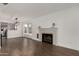 Open dining area with hardwood floors and kitchen views at 1506 E Topeka Dr, Phoenix, AZ 85024