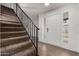 Bright entryway with wood-look floors and a white door at 1506 E Topeka Dr, Phoenix, AZ 85024