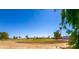 View of a lush green golf course on a sunny day at 15245 S Country Club Dr, Arizona City, AZ 85123