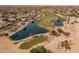 Community overview, showcasing homes and a golf course at 15513 W Coral Pointe Dr, Surprise, AZ 85374