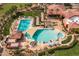 Resort-style pool with spa and shaded areas at 15513 W Coral Pointe Dr, Surprise, AZ 85374