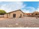 Gravel backyard with pergola and storage shed at 15720 W Crocus Dr, Surprise, AZ 85379