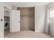 Bedroom with closet and access to laundry room at 15720 W Crocus Dr, Surprise, AZ 85379