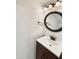 Small bathroom with vanity, mirror, and modern fixtures at 1601 N Saba St # 306, Chandler, AZ 85225