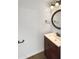 Simple bathroom with single sink and dark wood vanity at 1601 N Saba St # 306, Chandler, AZ 85225