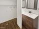 Bathroom with vanity, mirror and laundry area at 1601 N Saba St # 306, Chandler, AZ 85225