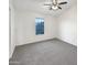 Bright bedroom with carpet flooring and a large window at 1601 N Saba St # 306, Chandler, AZ 85225