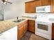 Well-equipped kitchen with granite countertops at 1601 N Saba St # 306, Chandler, AZ 85225