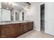 Elegant bathroom with granite countertops and double sinks at 17183 W San Marcos St, Surprise, AZ 85388