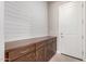 Laundry room with built-in cabinets and modern design at 17183 W San Marcos St, Surprise, AZ 85388