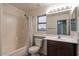 Clean bathroom with shower/tub combo and vanity at 17427 W Rock Wren Ct, Goodyear, AZ 85338