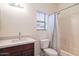 Clean bathroom with single vanity and shower/tub at 17427 W Rock Wren Ct, Goodyear, AZ 85338