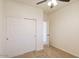 Bedroom with double-door closet and carpet at 17427 W Rock Wren Ct, Goodyear, AZ 85338