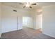 Spacious bedroom with access to hallway and other rooms at 17427 W Rock Wren Ct, Goodyear, AZ 85338