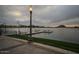 Lakefront dock with benches and calm water at 17427 W Rock Wren Ct, Goodyear, AZ 85338