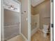 Bathroom featuring a tub, shower and toilet with tile flooring at 18009 W Denton Ave, Litchfield Park, AZ 85340