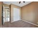 Spacious bedroom with carpet flooring and double door closet at 18009 W Denton Ave, Litchfield Park, AZ 85340