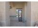 Inviting entryway with decorative door and tiled flooring at 18009 W Denton Ave, Litchfield Park, AZ 85340