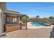 Pool area with spa and pergola at 18009 W Denton Ave, Litchfield Park, AZ 85340