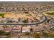 Aerial view showcasing home location within a golf course community at 18135 N Saddle Ridge Dr, Surprise, AZ 85374