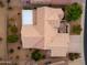 Aerial view of house, yard, and surrounding neighborhood at 18135 N Saddle Ridge Dr, Surprise, AZ 85374