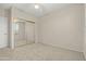 Mirrored closet in this bright bedroom at 18135 N Saddle Ridge Dr, Surprise, AZ 85374