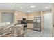 Modern kitchen featuring granite countertops and stainless steel appliances at 18135 N Saddle Ridge Dr, Surprise, AZ 85374