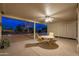 Covered patio with seating and ceiling fan at 18135 N Saddle Ridge Dr, Surprise, AZ 85374