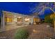 Spacious backyard patio with pergola and seating at 18135 N Saddle Ridge Dr, Surprise, AZ 85374