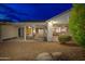 Covered patio with kitchen view and seating area at 18135 N Saddle Ridge Dr, Surprise, AZ 85374