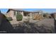 Spacious backyard with gravel and desert landscaping at 18171 W Glenhaven Dr, Goodyear, AZ 85338