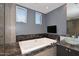 Bathroom with granite countertop and soaking tub at 18258 N 15Th Pl, Phoenix, AZ 85022