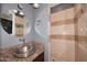 Bathroom with shower and pedestal sink at 18258 N 15Th Pl, Phoenix, AZ 85022