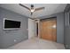 Bedroom with built-in cabinets and TV at 18258 N 15Th Pl, Phoenix, AZ 85022