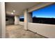 Long covered patio with tile floor and multiple windows at 18258 N 15Th Pl, Phoenix, AZ 85022