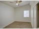 Bright bedroom with wood-look flooring and ceiling fan at 1918 W Colter St, Phoenix, AZ 85015