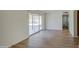 Living room with wood-look floors and sliding glass doors at 1918 W Colter St, Phoenix, AZ 85015