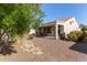 Covered patio and small desert landscape at 21532 N 262Nd Ln, Buckeye, AZ 85396