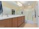 Double vanity bathroom with large shower at 21532 N 262Nd Ln, Buckeye, AZ 85396